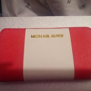 Pink and white Michael kors wallet